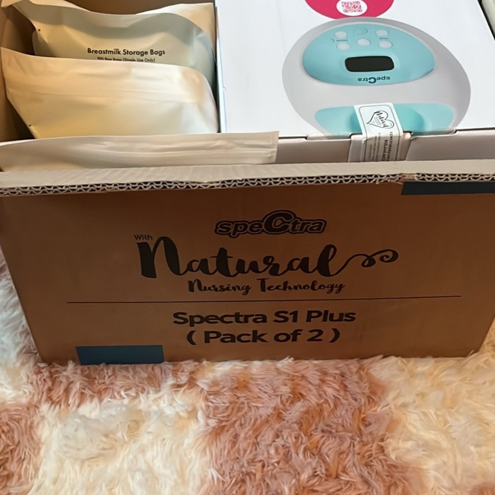 Spectra S1 breast pump plus 300 bags brand new- never opened